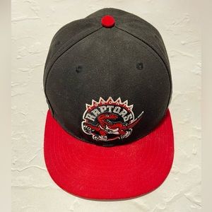 Used New Era fitted Toronto Raptors hat with retro logo. Size 7 1/4. 8/10.
